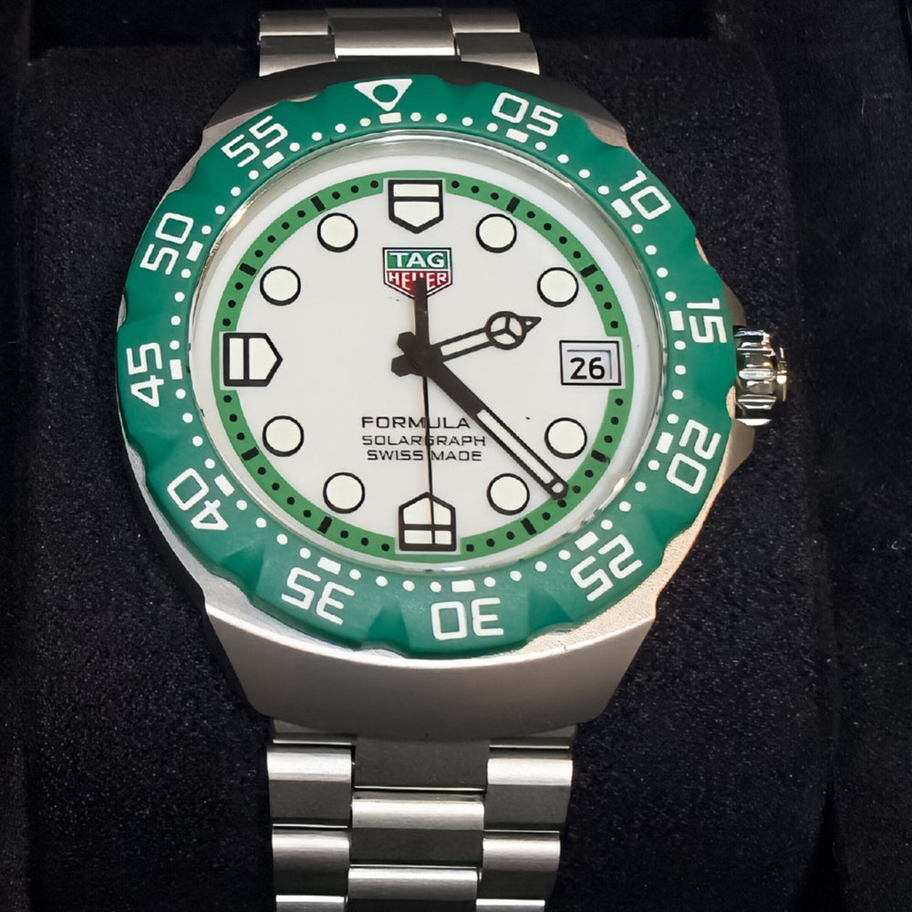 Tag Heuer Solargraph, Green bezel. Ref: WBY1113, Brand new unworn, box and papers.